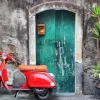 Vespa At The Door